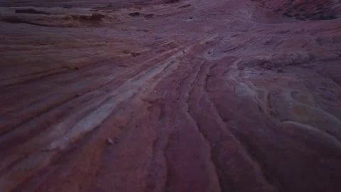 Gimbal booming up and rolling focus shot of the sandstone Fire Wave in Stock Footage 232401458