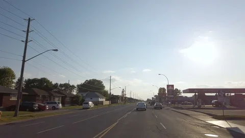 Gimbal Driving Shot Entering Thunder Bay Commercial Areas Stock Footage 125324341