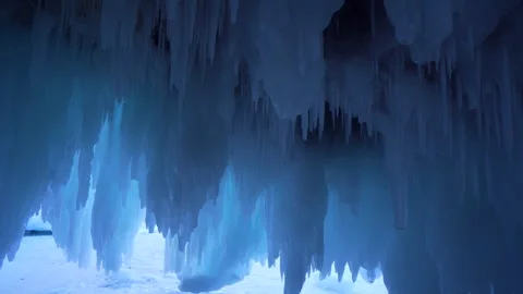 Gimbal glacial ice formations, sharp icicles in ancient cave Siberia Baikal lake Stock Footage 316454500