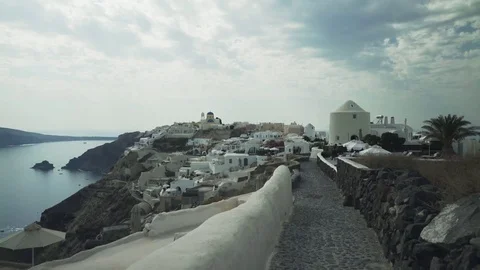 Gimbal shot approaching the village of oia, santorini Stock Footage 72488129