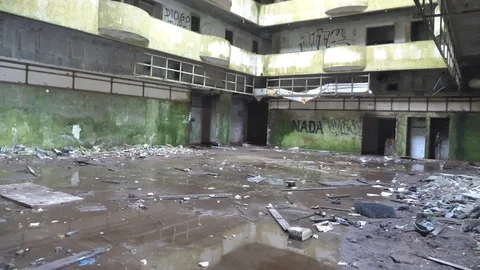 Gimbal Shot Exploring Inside A Destroyed Flooded Abandonded Building Old Hotel Stock Footage 89387560