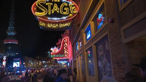 Gimbal shot of neon signs on broadway in nashville, tn Stock Footage