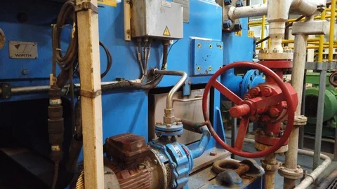 Gimbal shot of triplex mud pumps for oil drilling rig Stock Footage 116789996