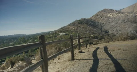 Gimbal shot of the view of fire damage caused by Thomas Fire in Montecito hills Stock Footage 99147587