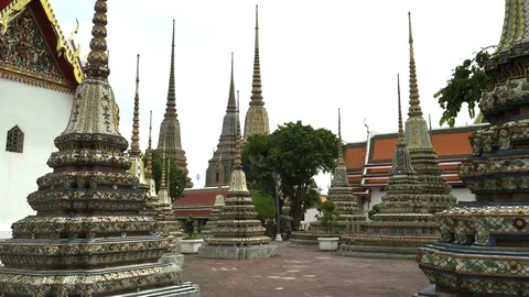 Gimbal shot walking between stupa at wat pho temple, bangkok Stock Footage 79670368