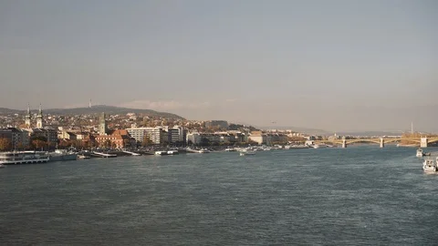 Gimbal shot of wide angle view of two sides of Budapest, Hungarian Parliament 動画素材 125135201