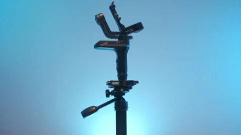 Gimbal  stabilizer Tripod Head Holding Camera Stock Footage 139496262