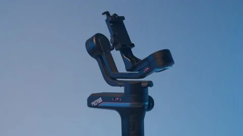 Gimbal  stabilizer Tripod Head Holding Camera Stock Footage 139496272