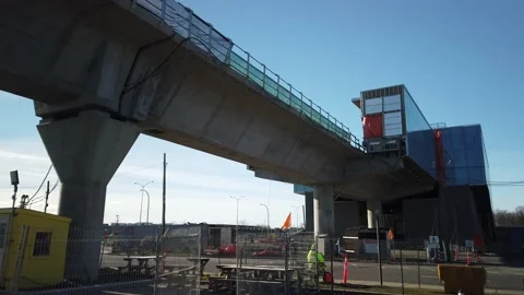 Gimbal Tracking Shot of REM Light Rail Construction Stock Footage 224778386