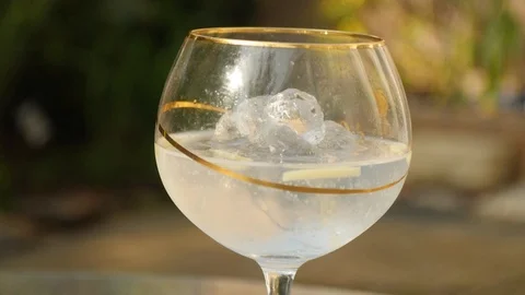 Gin and Tonic in the sun Stock Footage 115057258