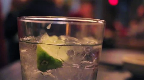 Gin Drink with Lime and Ice Stock Footage 58997381