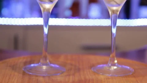 Gin Gibson cocktail. Moving camera from bottom to top. Alcoholic cocktail with Stock Footage 71444768