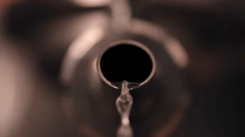 Gin Pooring from the distillery Stockbeeldmateriaal 129376248