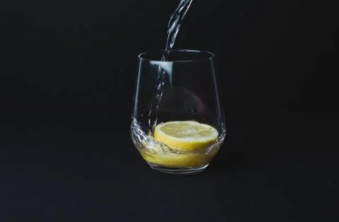 Gin tonic isolated on black background Stock Photos