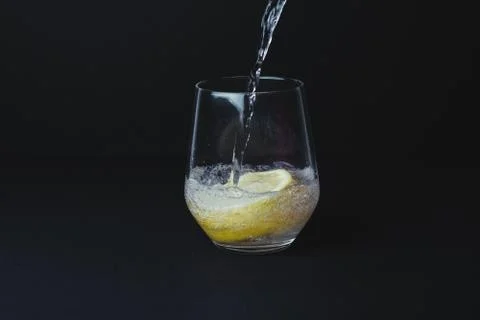 Gin tonic isolated on black background Stock Photos