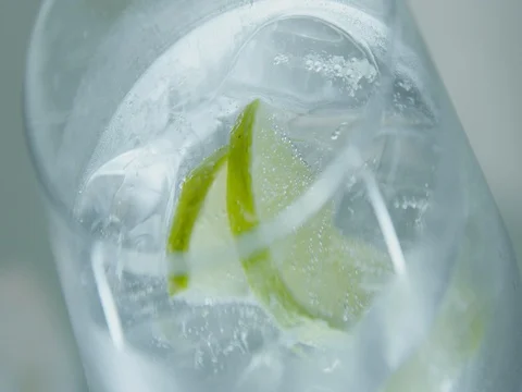 Gin Tonic with lime macro Stock Footage 76677546