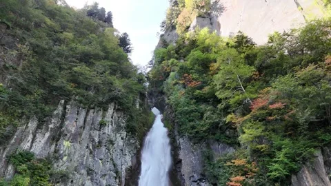 Ginga Waterfall | Close-up | Flowing Water | Cliff | Early Autumn | Hokkaido Stock Footage 329049980