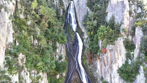 Ginga Waterfall | Full View | Vertical Cliff | Early Autumn | Nature | Hokkaido Stock Footage 329050017