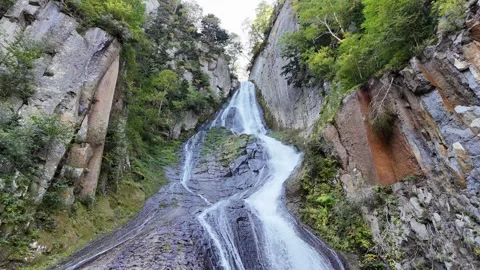 Ginga Waterfall | Low Angle | Looking Up | Cliff | Early Autumn | Hokkaido Stock Footage 329050019