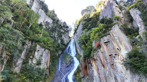 Ginga Waterfall | Low Angle View | Cliff | Early Autumn | Hokkaido Stock Footage 329050026