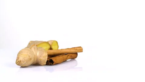 Ginger and cinnamon rotating on white background. 4k resolution Stock Footage 171655390