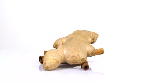 Ginger and cinnamon rotating on white background. 4k resolution Stock Footage 171666493