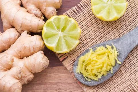 Ginger and lemon on the table seen from above Stock Photos