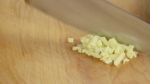 Ginger being chopped Stock-Footage 24666693