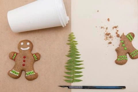 Ginger bread cookies on craft background with leaf of fern. Coffee mockup. Top Stock Photos