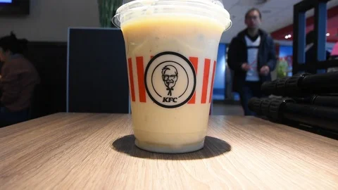 Ginger Bread Crunch Milkshake AT KFC Restaurant The Hague Netherlands 2019 Stock Footage 122561154