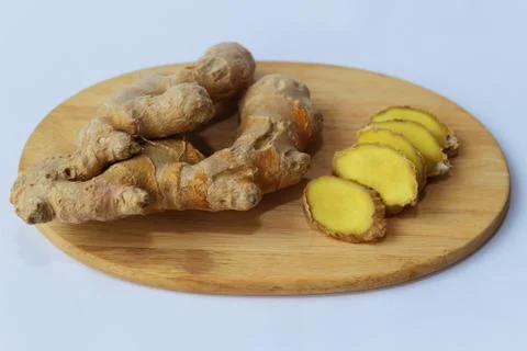 Ginger on a chopping board Stock Photos