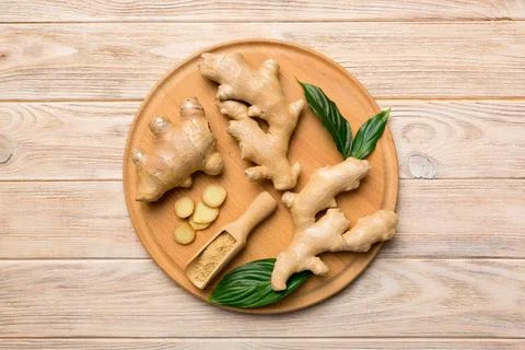 Ginger on Cutting board table, top view. Space for text Stock Photos