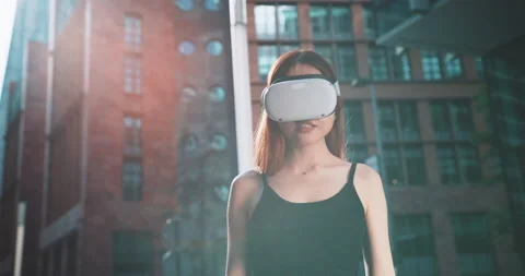 Ginger girl trying virtual reality goggles Stock Footage 201679536
