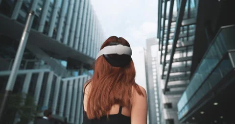Ginger girl using vr glasses in the business district Stock Footage 201686882