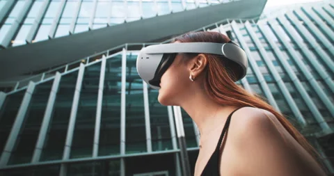 Ginger girl walking while using vr goggles Stock Footage 201679676