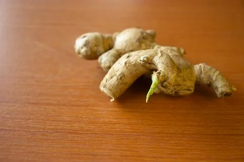 Ginger herbal plant. placed on a brown table Stock Photos
