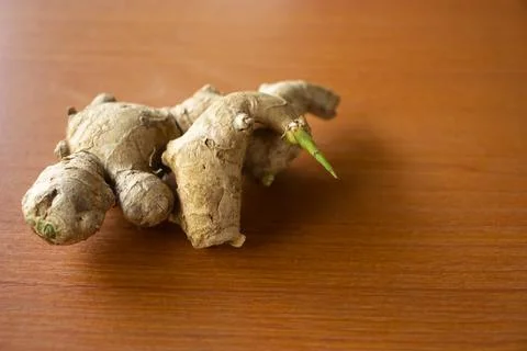 Ginger herbal plant. placed on a brown table Stock Photos