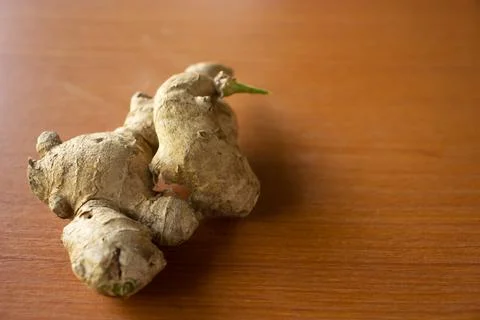 Ginger herbal plant. placed on a brown table Stock Photos