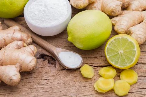 Ginger, lemon and baking on the table Stock Photos