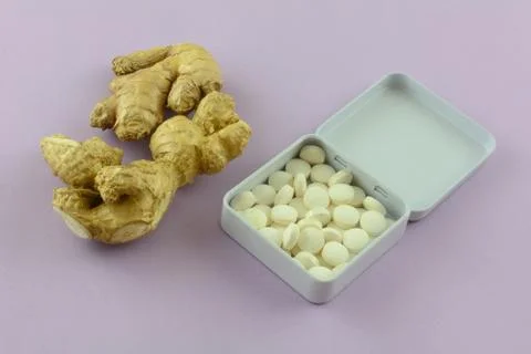 Ginger mints and fresh ginger Stock Photos