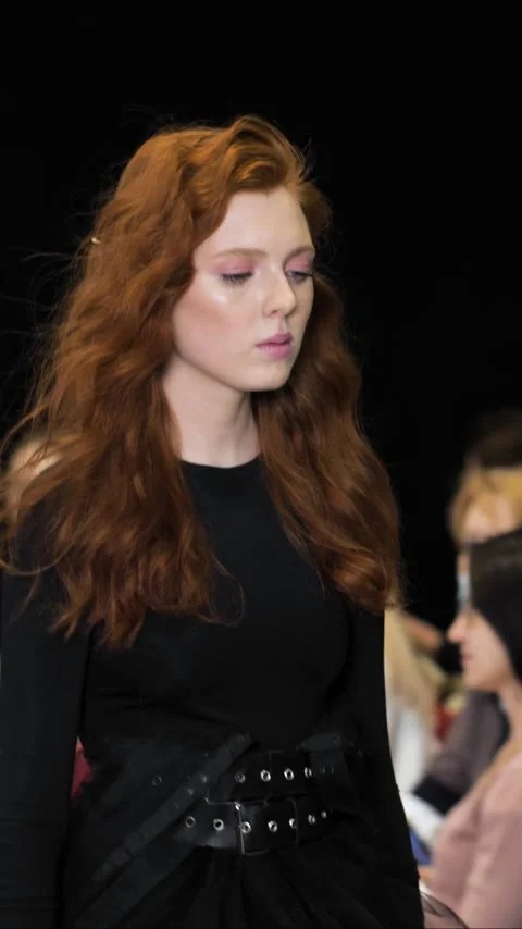 Ginger model walking on defile podium. Catwalk runway by redhead girl lace dress Видео 347123783