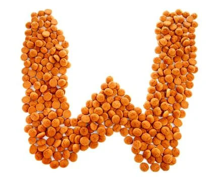 Ginger nuts, pepernoten, in the shape of letter w Foto stock