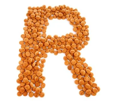 Ginger nuts, pepernoten, in the shape of letter r Foto stock