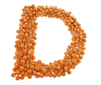 Ginger nuts, pepernoten, in the shape of letter d Foto stock