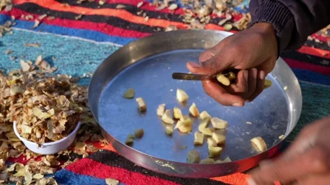 Ginger or adrak known as (Zingiber officinale). Ginger roots peeling Stock-Footage 227905169