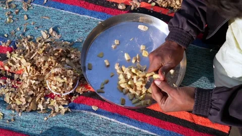 Ginger or adrak known as (Zingiber officinale). Ginger roots peeling Stock-Footage 227905741
