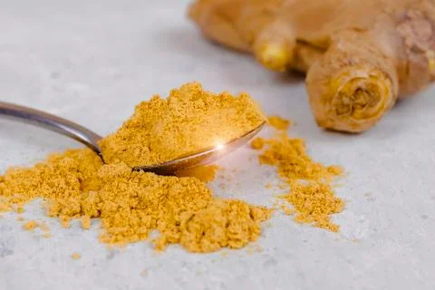 Ginger root and ginger powder Stock Photos