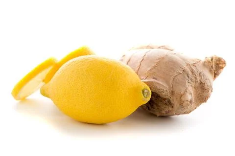 Ginger root and lemon slice Ginger root and lemon slice isolated on white ... Stockfoto's
