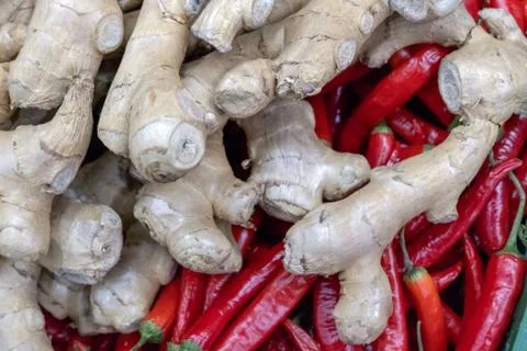 Ginger root and red chilean pepper. Food background. Harvest or shelf at the  Stock Photos