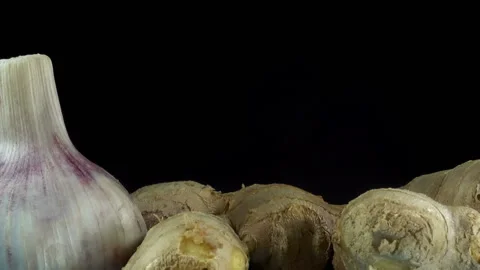 Ginger root with head of garlic Video stock 170723257